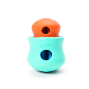 West Paw Toppl enrichment toy stuffed with dog treats, placed on a clean surface, ready for interactive play